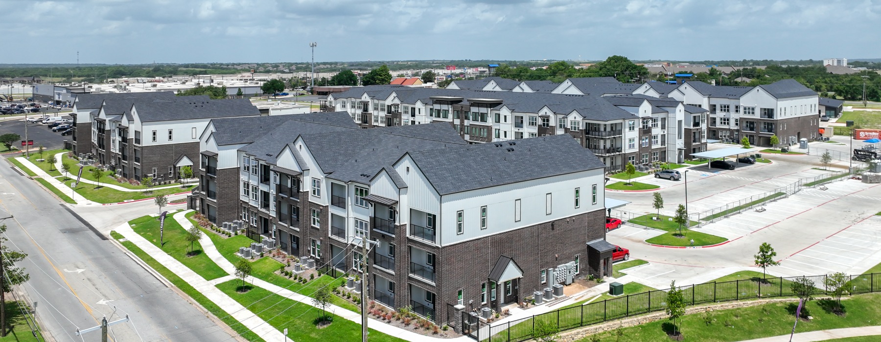 Aerial view of Aspire at Sherman apartment community featuring modern apartment homes in Sherman, TX