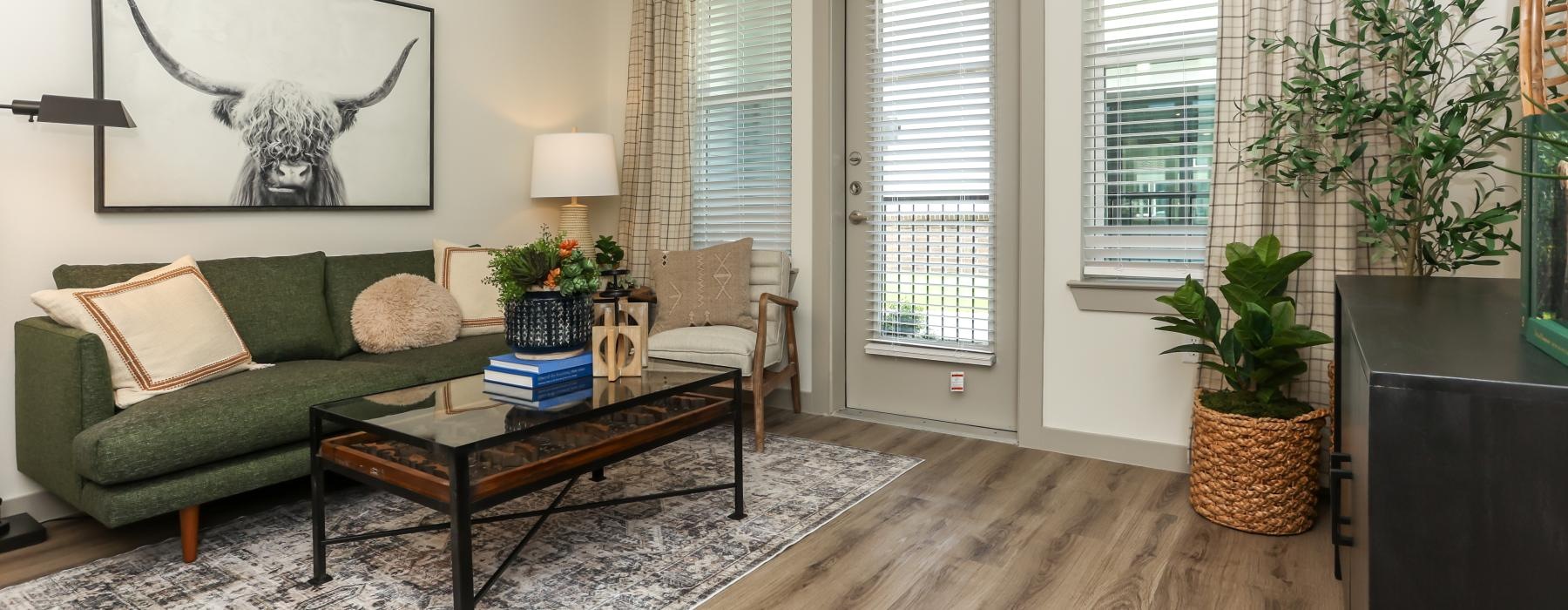 a living room with a couch and coffee table