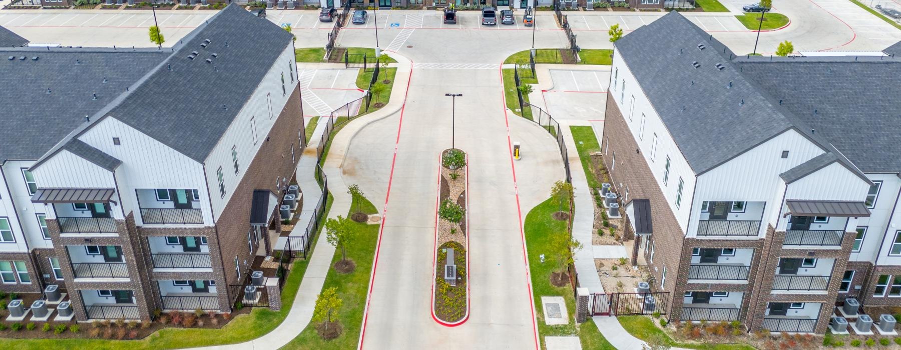 a road with buildings on the side